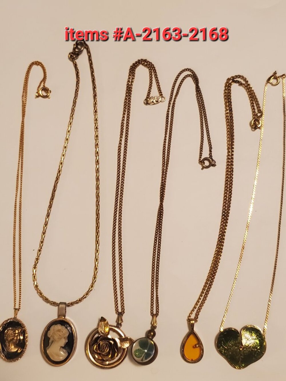 6 Gold Chain Necklaces with pendants, items # A -2163-2168, wt. 61 grams.